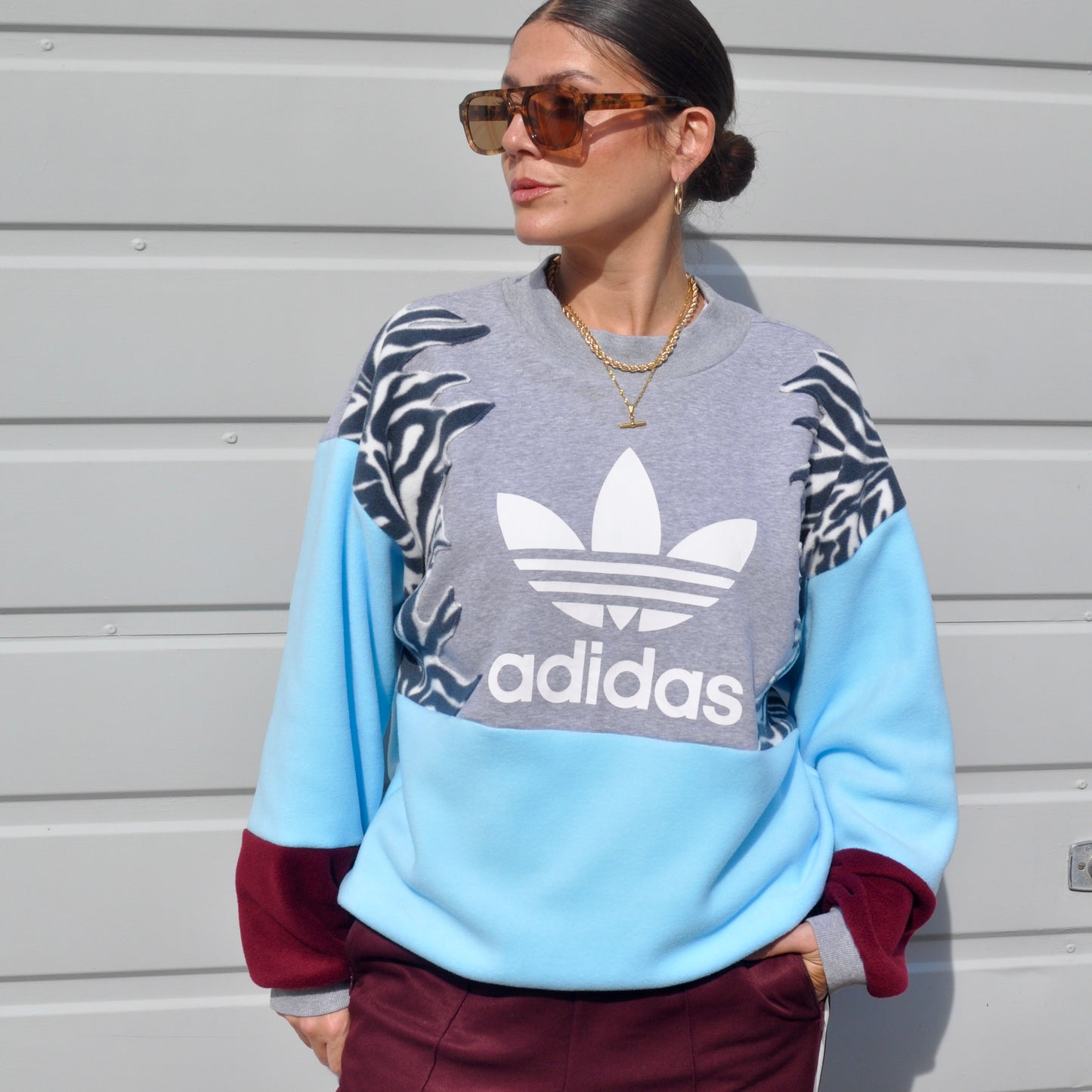 Adidas zebra stripe fleece sweatshirt.