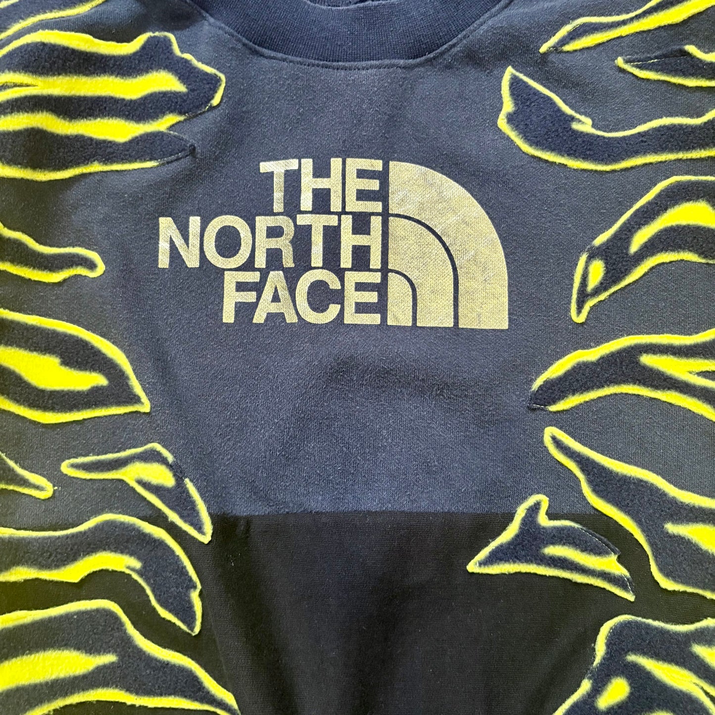 North face yellow zebra stripe patchwork fleece sweatshirt.