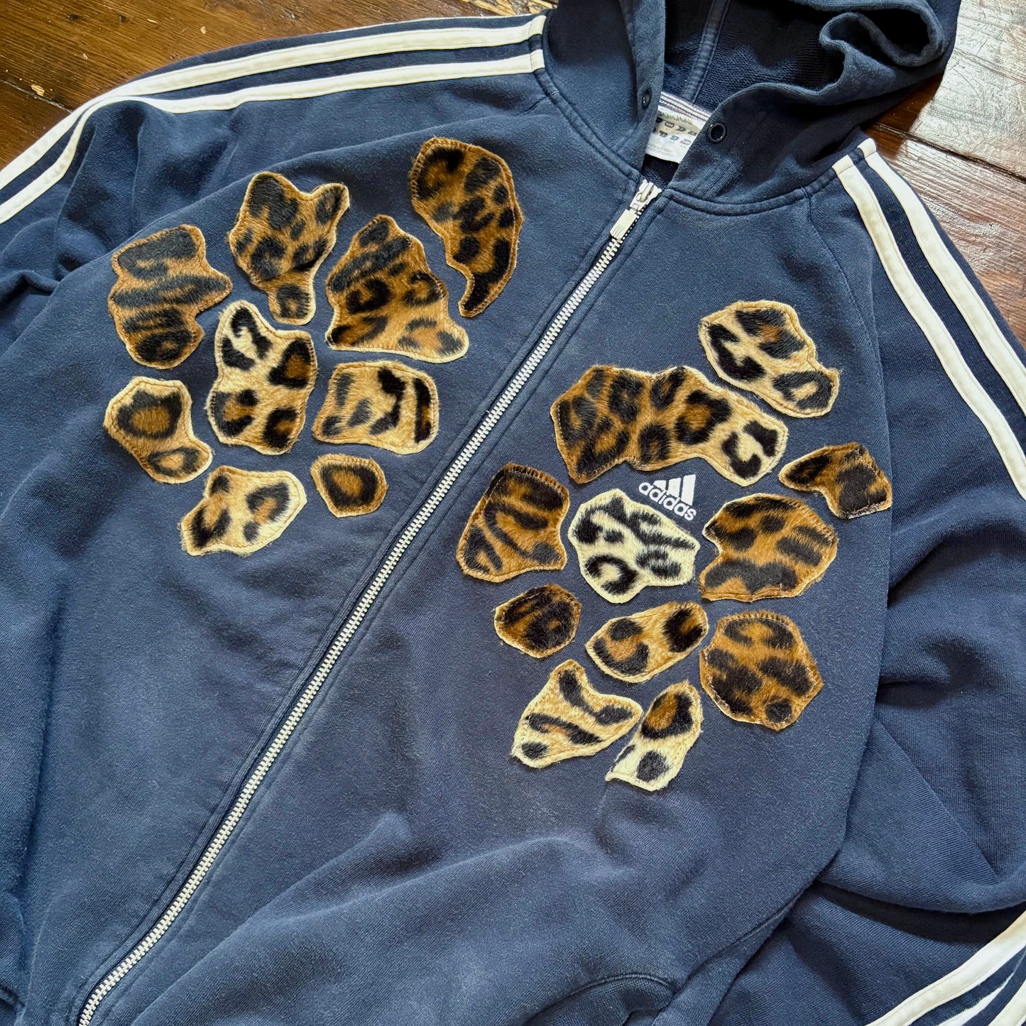 Navy blue adidas leopard patch hoodie sweatshirt.