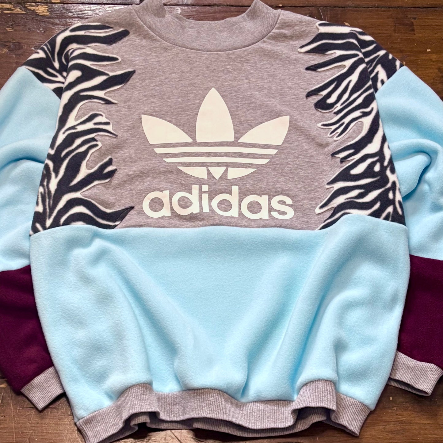 Adidas zebra stripe fleece sweatshirt.
