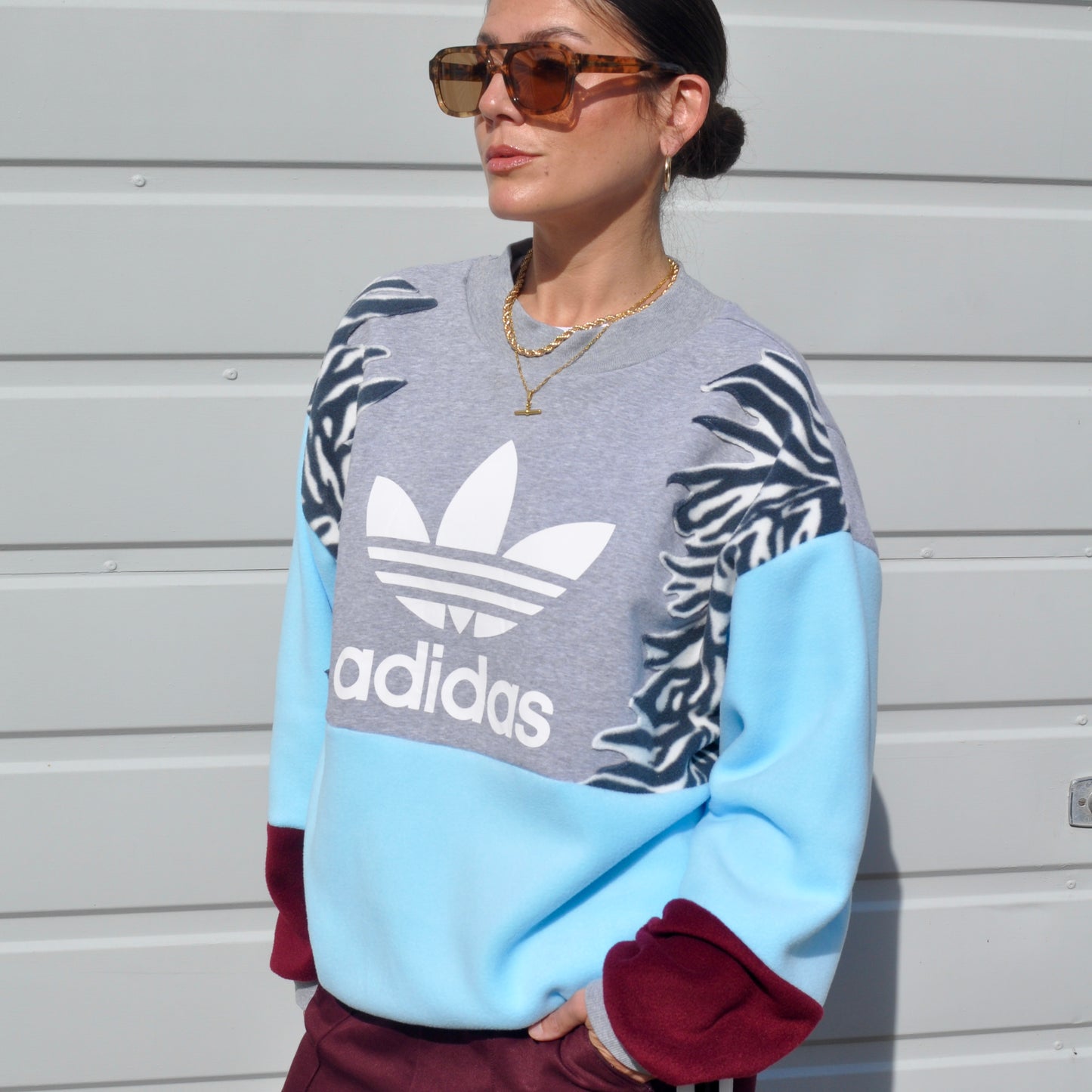 Adidas zebra stripe fleece sweatshirt.