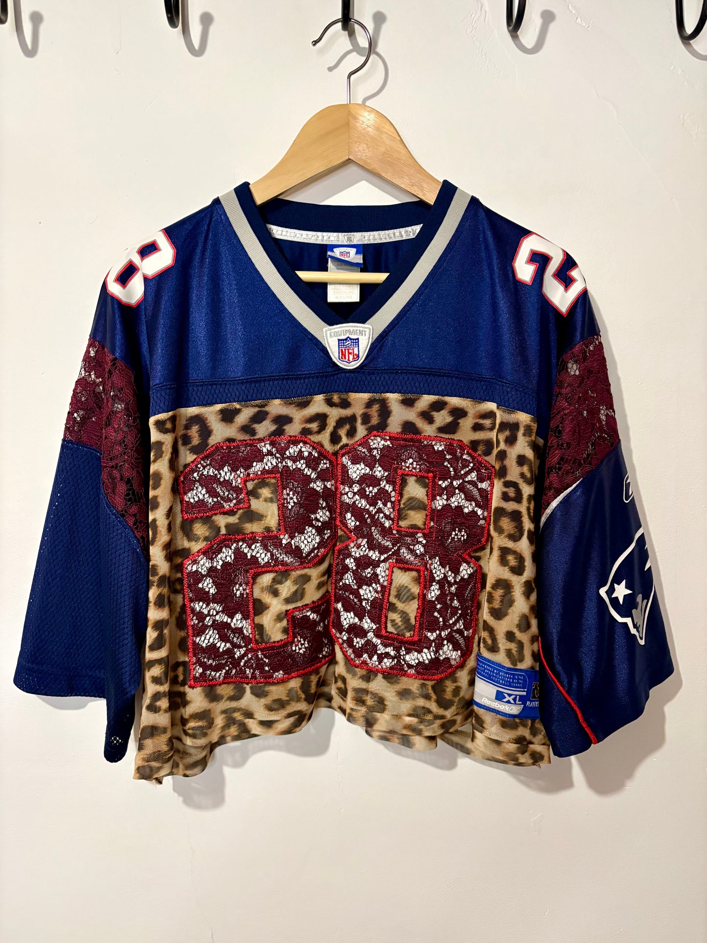 Vintage Y2K Reebok NFL New England Patriots leopard mesh, burgundy lace patchwork cropped jersey tshirt.