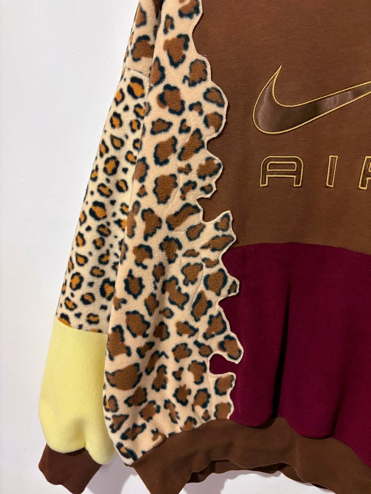 Y2K brown Nike air leopard print, burgundy and butter yellow fleece patchwork sweatshirt.