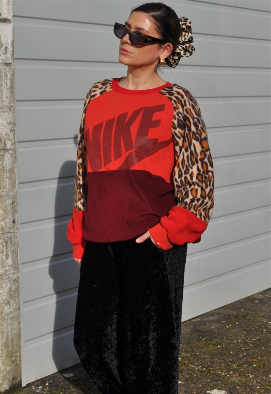 Y2K vintage reworked Nike leopard sweatshirt.