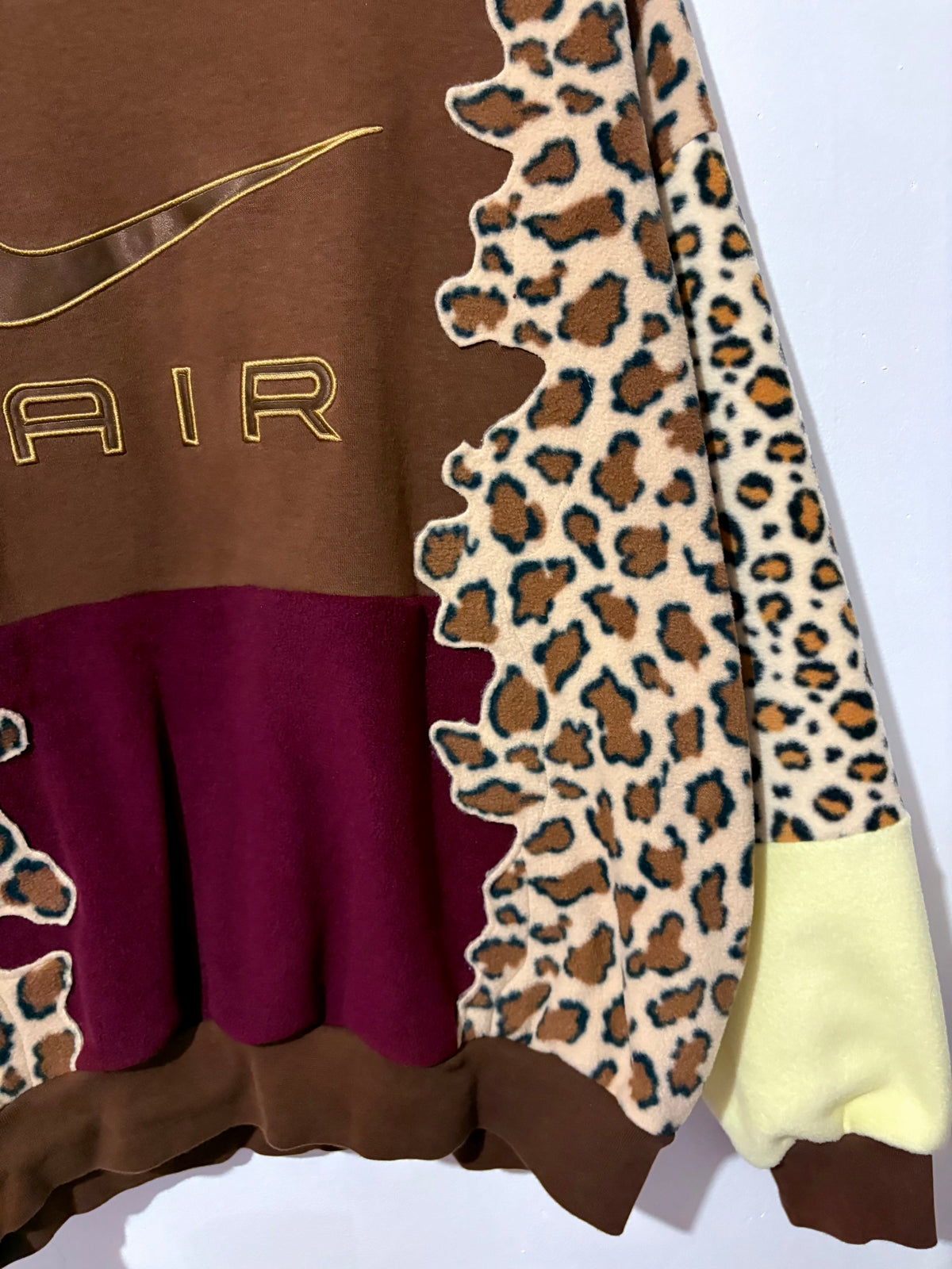 Y2K brown Nike air leopard print, burgundy and butter yellow fleece patchwork sweatshirt.