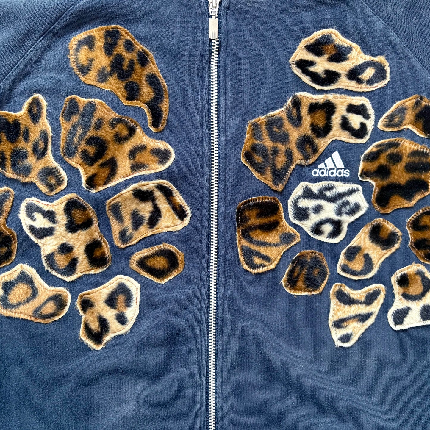 Navy blue adidas leopard patch hoodie sweatshirt.