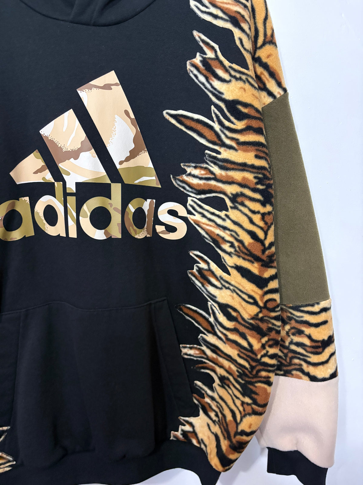 Y2K black adidas camouflage logo tiger stripe, khaki and beige fleece patchwork hoodie sweatshirt.
