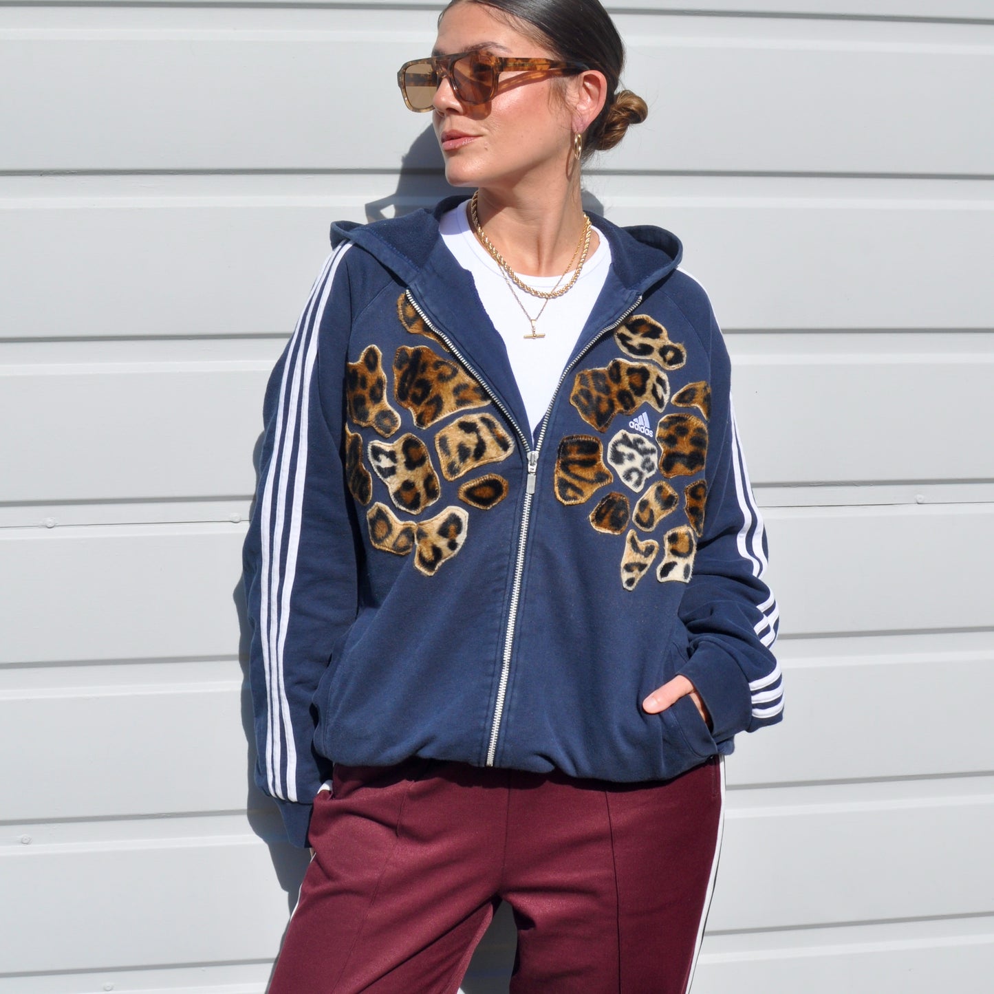 Navy blue adidas leopard patch hoodie sweatshirt.