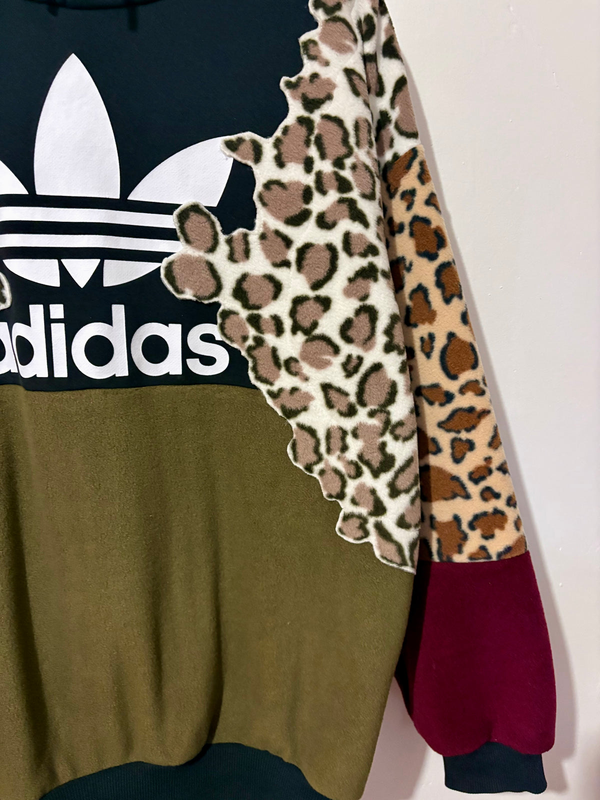 Y2K black adidas logo leopard print, khaki and burgundy fleece patchwork hoodie sweatshirt.