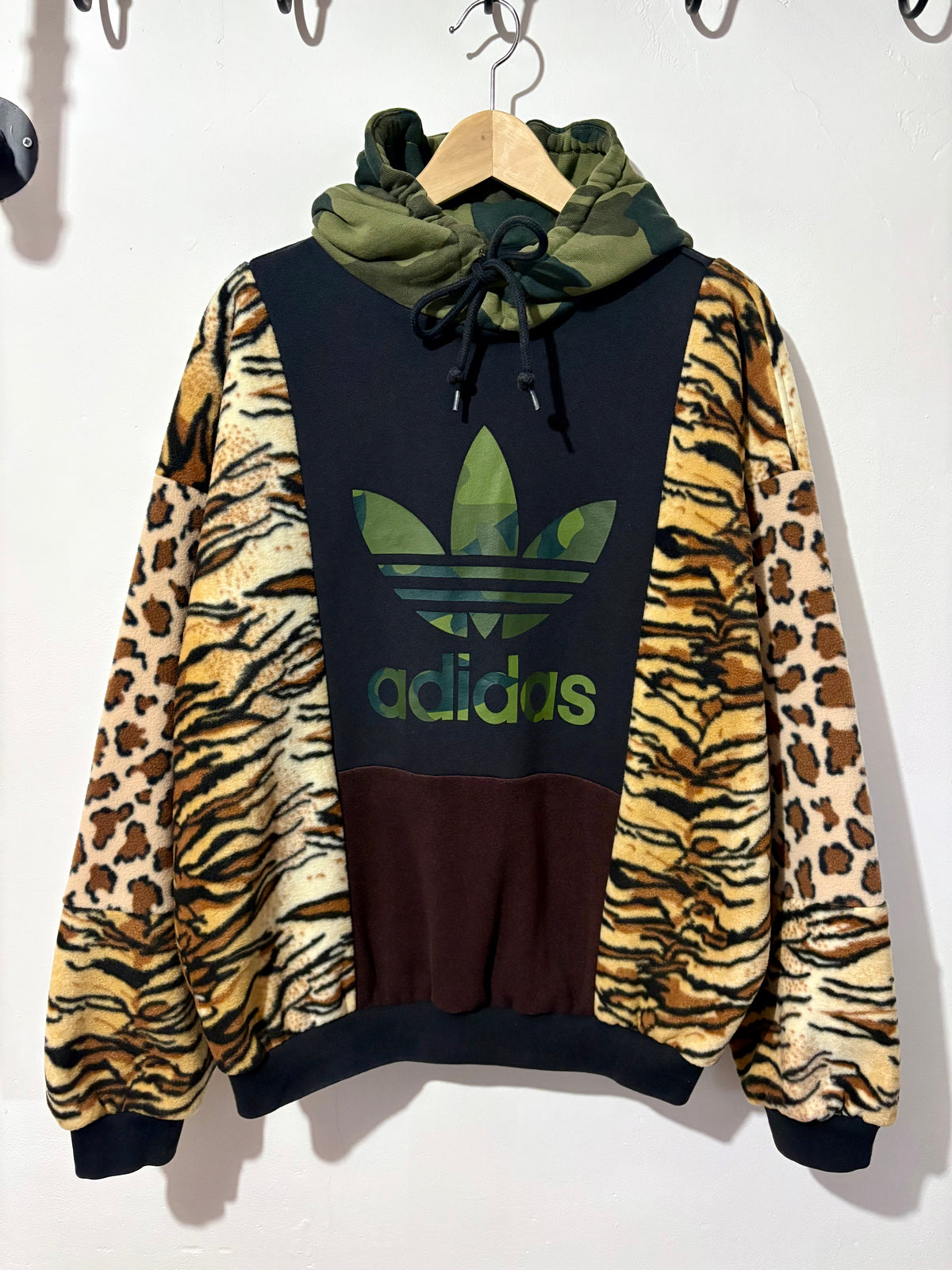 Y2K black adidas camouflage logo tiger and leopard fleece patchwork hoodie sweatshirt.