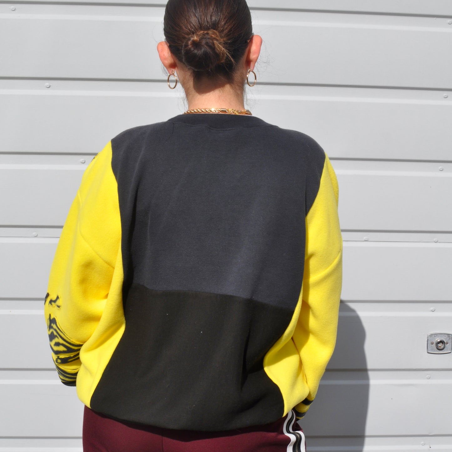 North face yellow zebra stripe patchwork fleece sweatshirt.