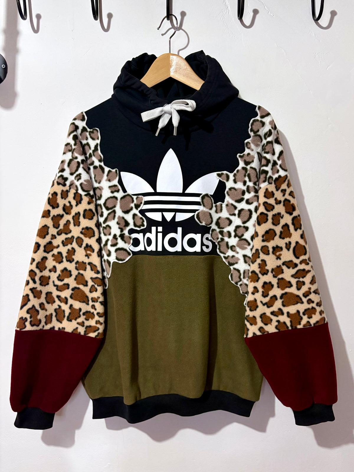 Y2K black adidas logo leopard print, khaki and burgundy fleece patchwork hoodie sweatshirt.
