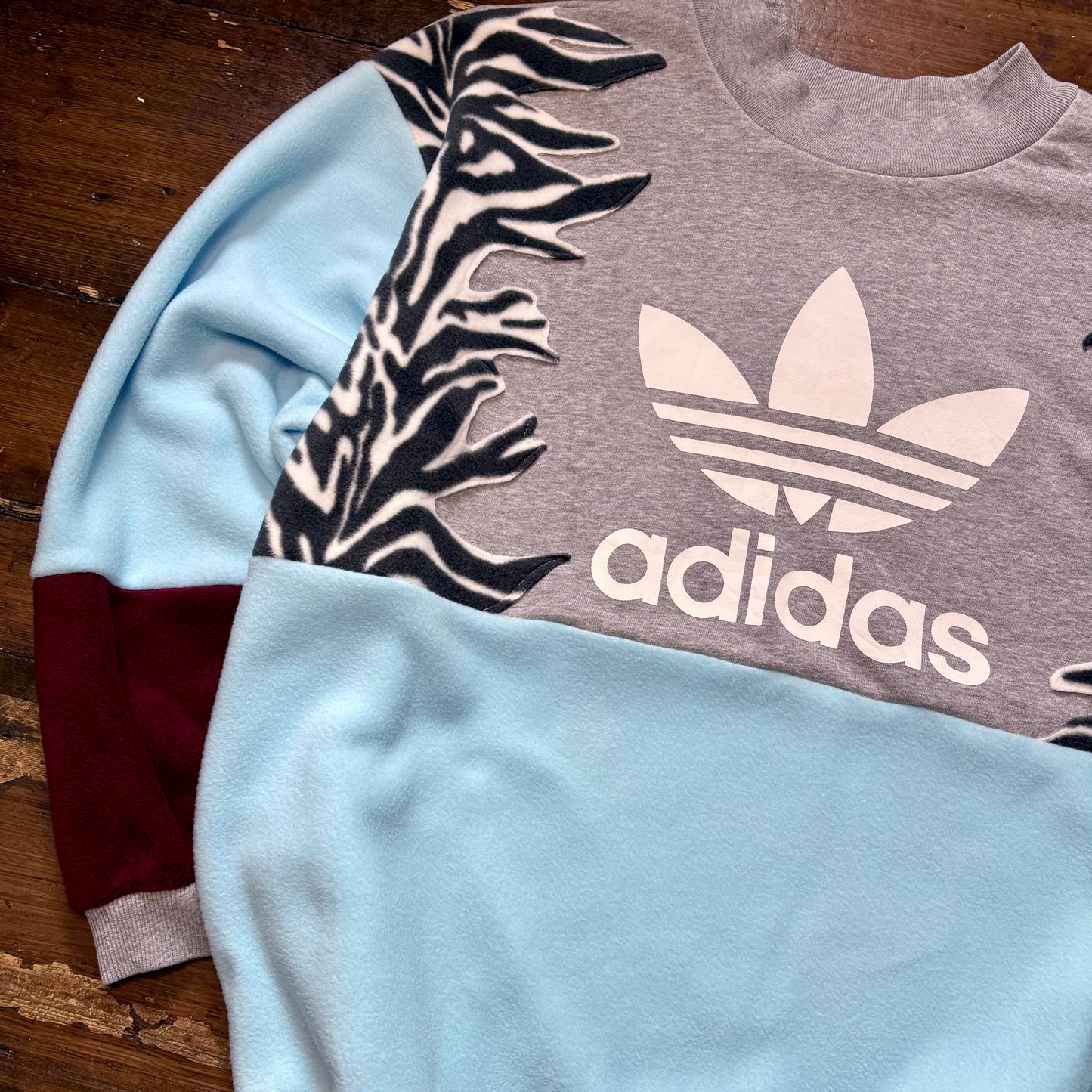 Adidas zebra stripe fleece sweatshirt.