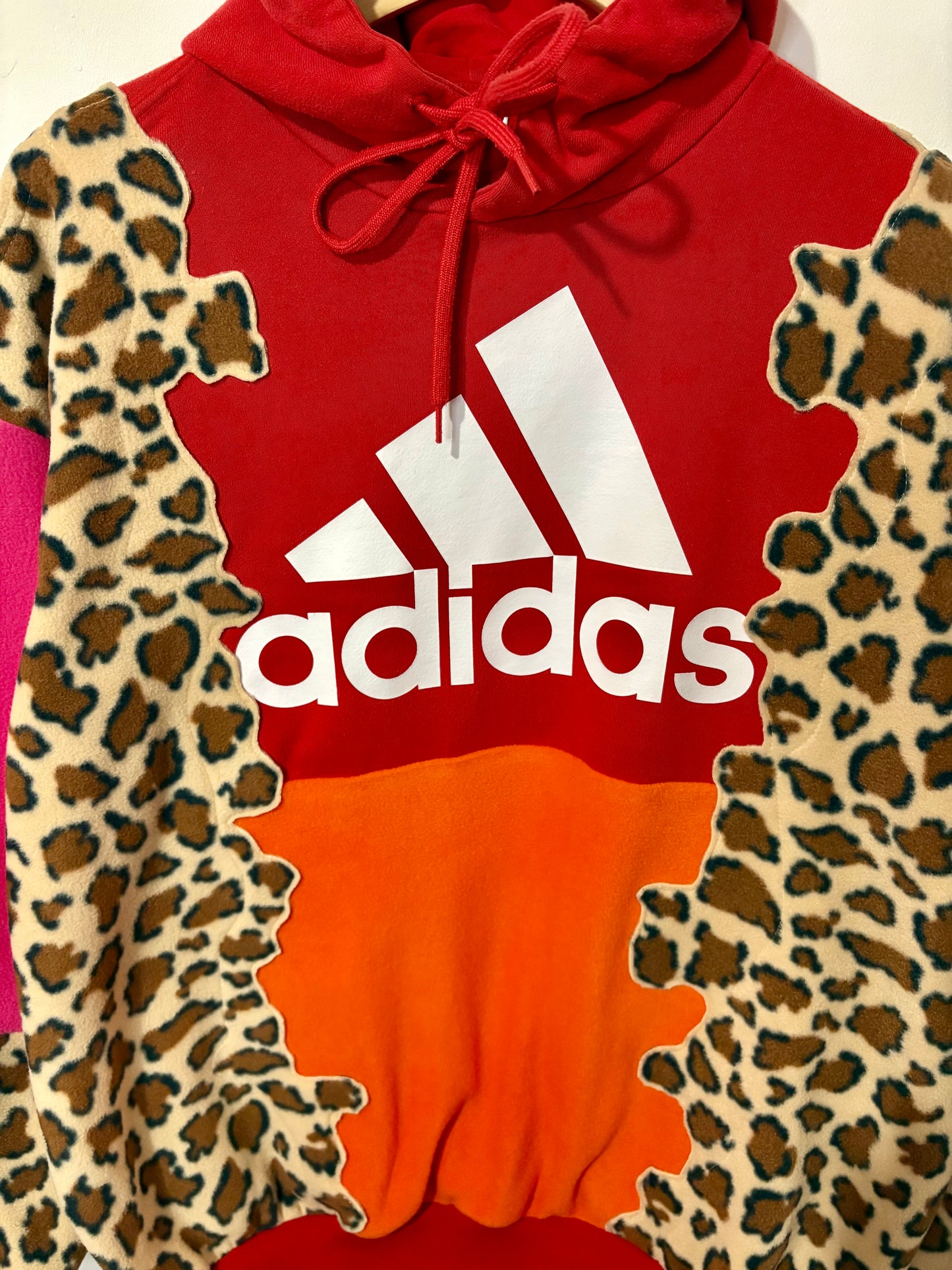 Y2K red adidas trefoil logo leopard print, pink and orange patchwork fleece hoodie sweatshirt.