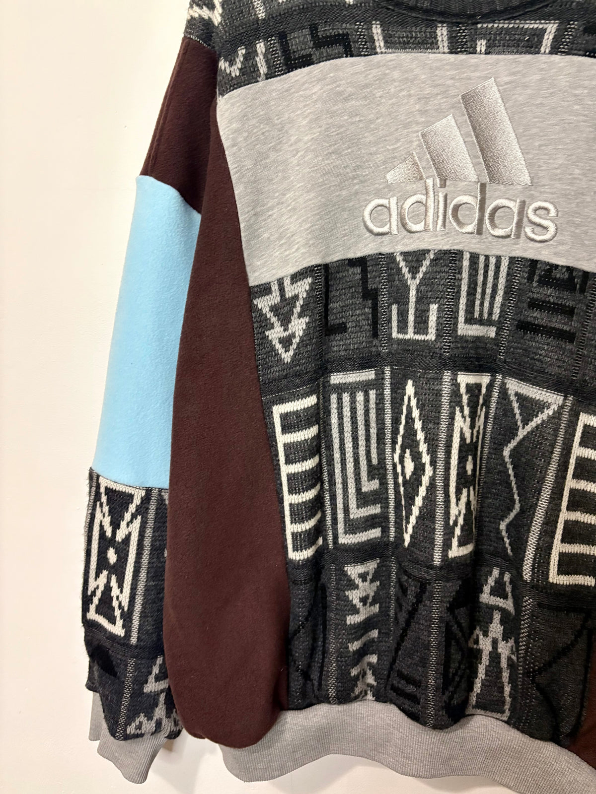 Vintage grey, brown and baby blue adidas logo funky pattern knit patchwork sweatshirt.