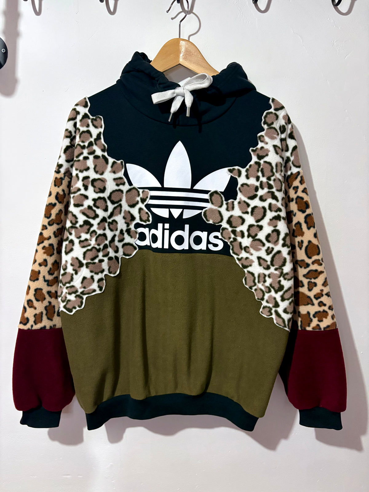 Y2K black adidas logo leopard print, khaki and burgundy fleece patchwork hoodie sweatshirt.