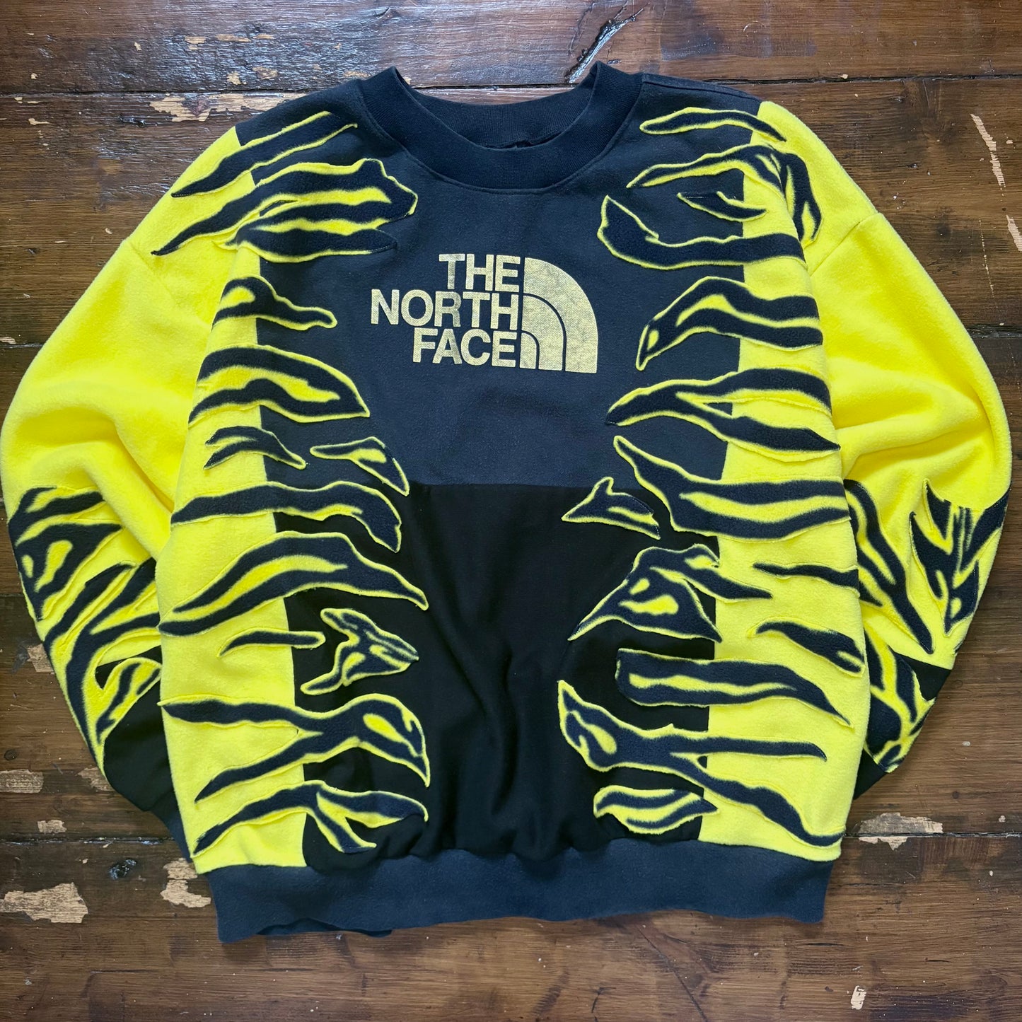 North face yellow zebra stripe patchwork fleece sweatshirt.