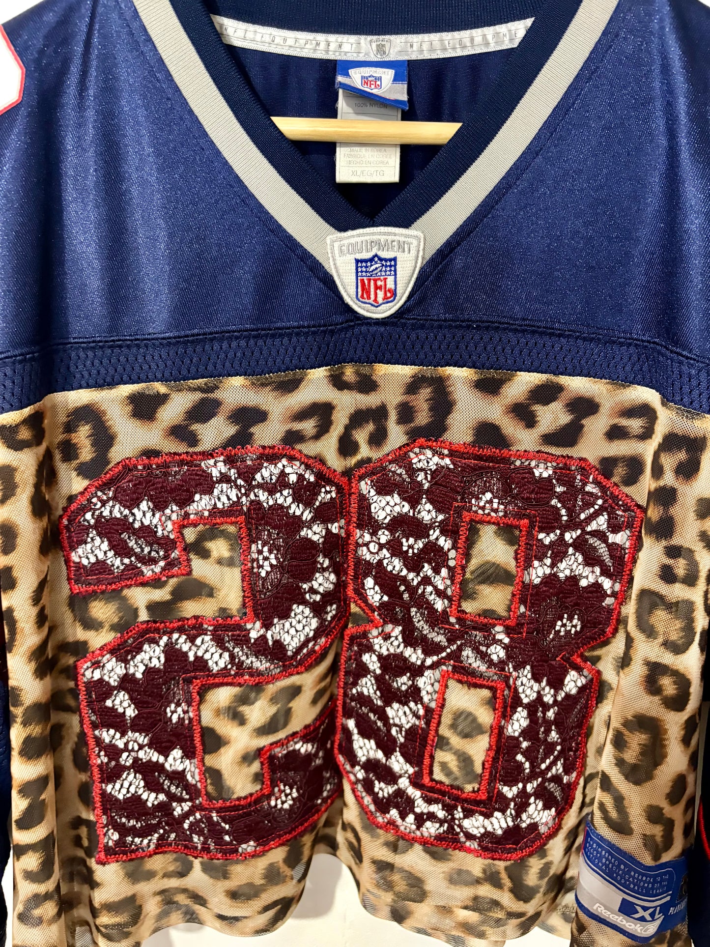 Vintage Y2K Reebok NFL New England Patriots leopard mesh, burgundy lace patchwork cropped jersey tshirt.