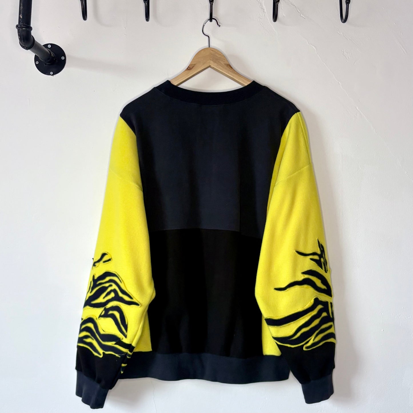 North face yellow zebra stripe patchwork fleece sweatshirt.