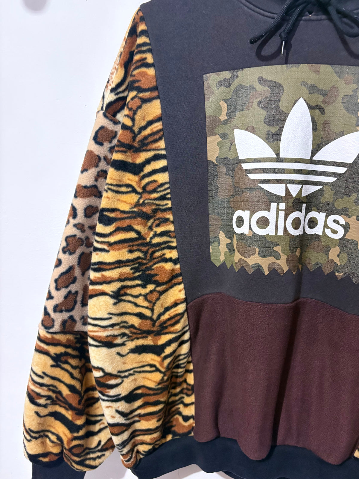 Y2K black adidas camouflage logo tiger and leopard fleece patchwork hoodie sweatshirt.