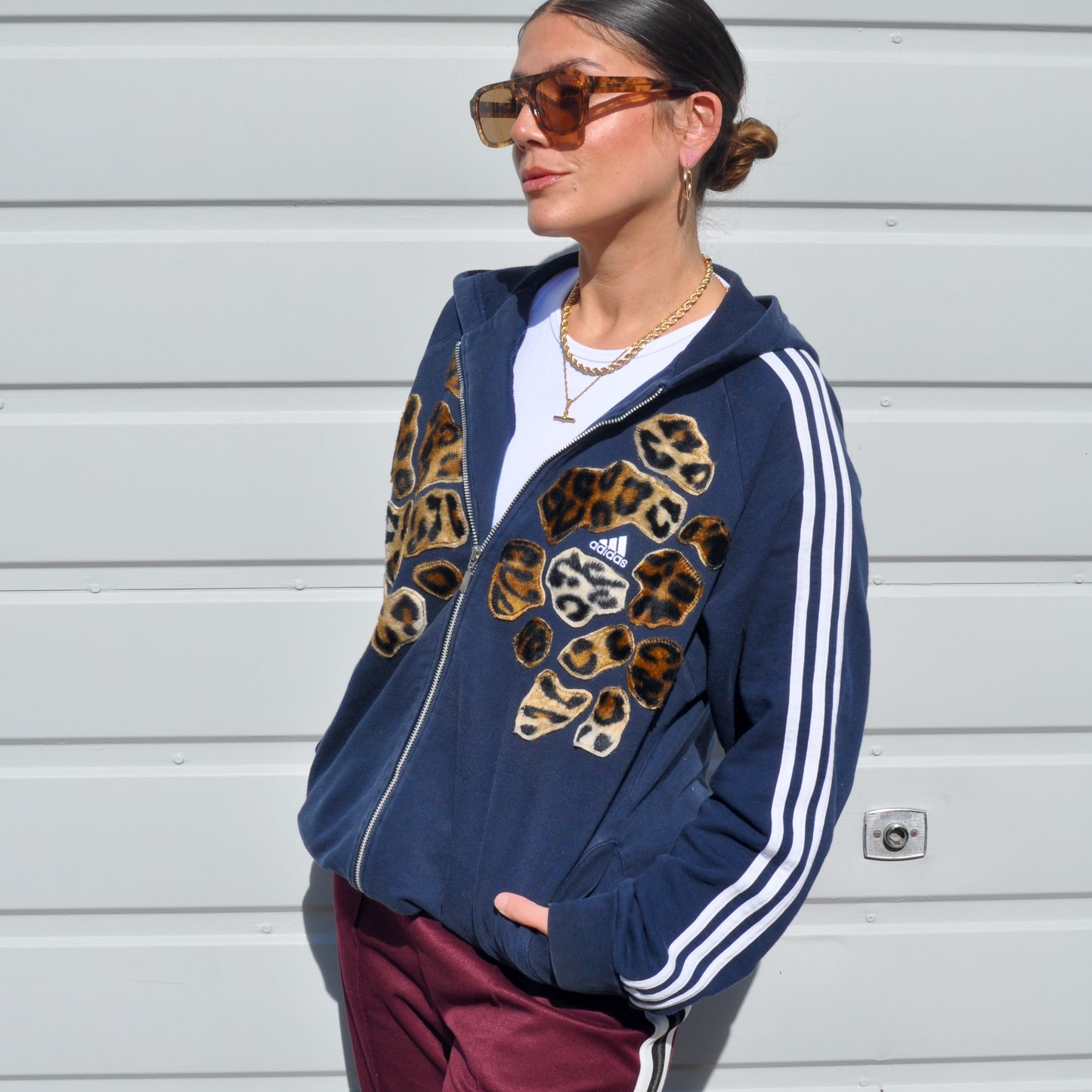 Navy blue adidas leopard patch hoodie sweatshirt.