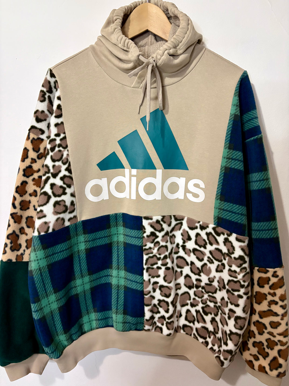Y2K beige adidas logo clashing checked tartan and leopard print patchwork hoodie sweatshirt.