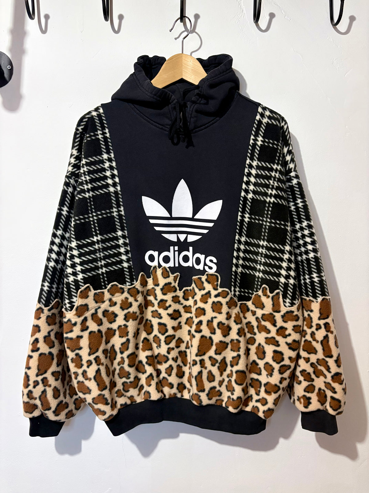 Y2K black adidas logo checked tartan and leopard print hoodie sweatshirt.