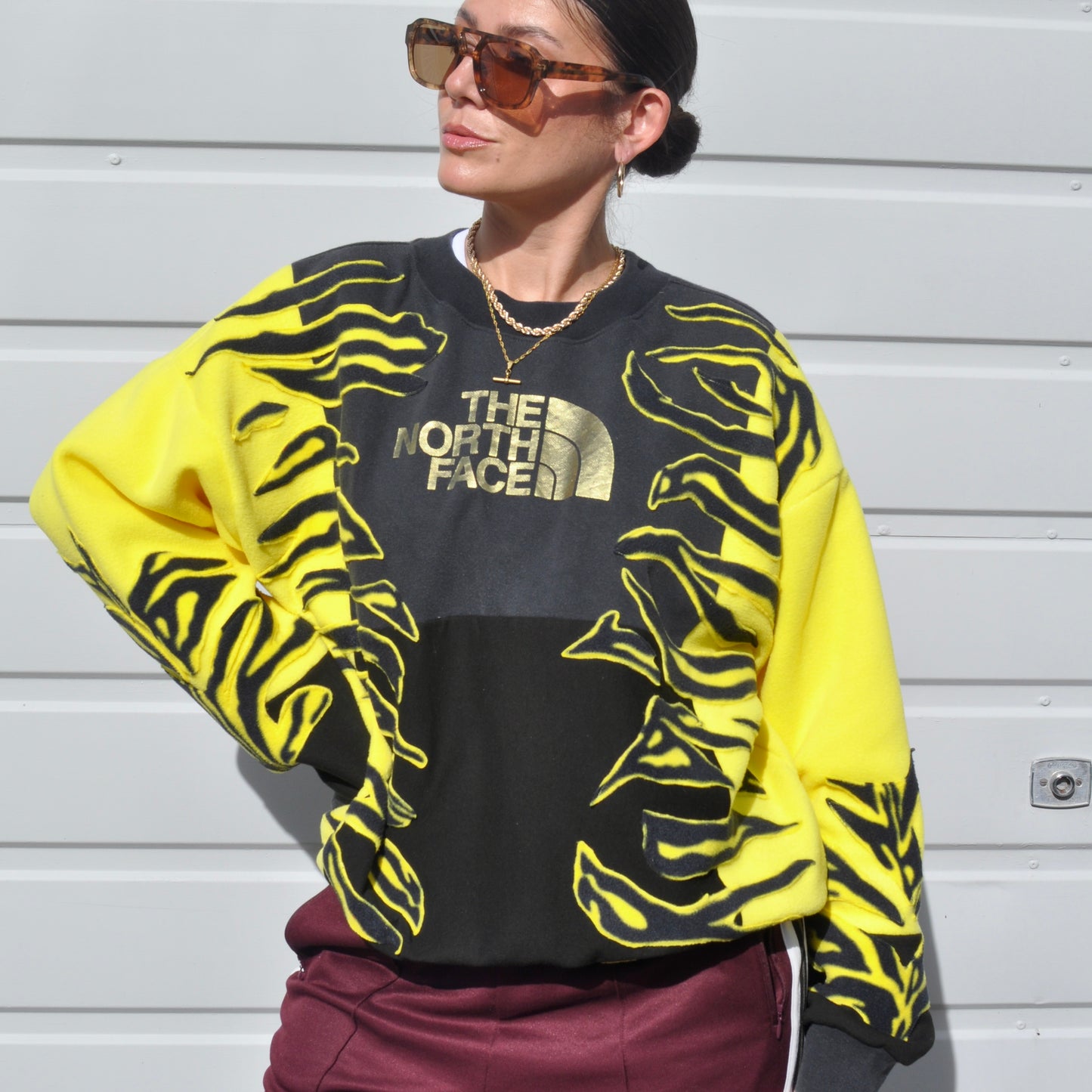 North face yellow zebra stripe patchwork fleece sweatshirt.