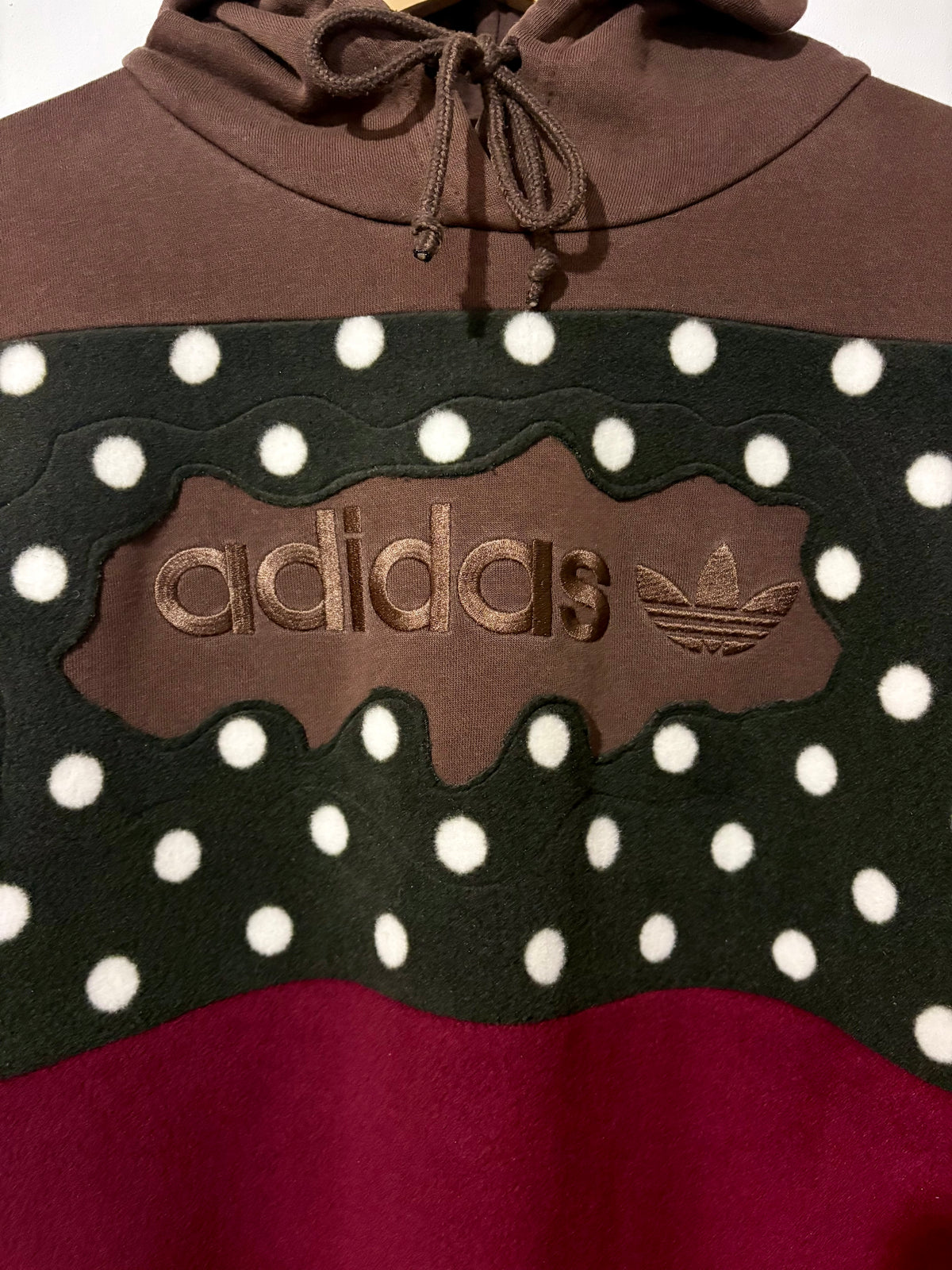 Y2K brown adidas logo polka dot and burgundy fleece stripe patchwork hoodie sweatshirt.