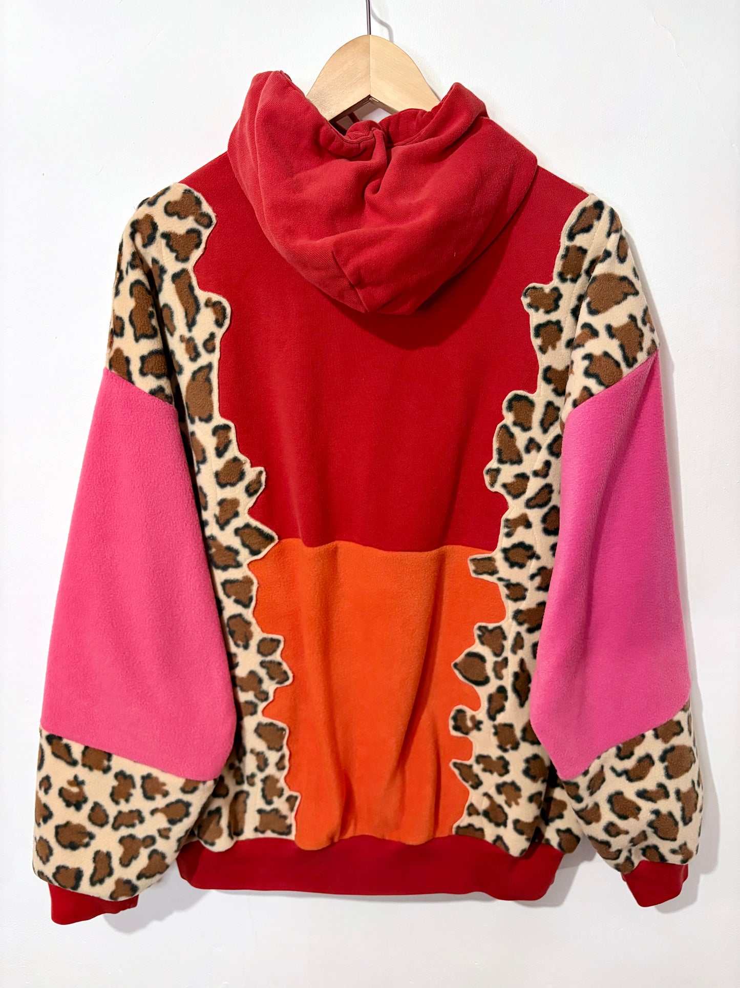 Y2K red adidas trefoil logo leopard print, pink and orange patchwork fleece hoodie sweatshirt.