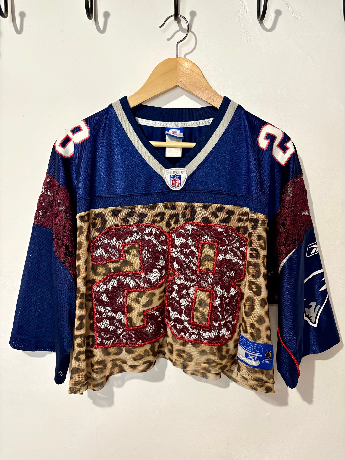 Vintage Y2K Reebok NFL New England Patriots leopard mesh, burgundy lace patchwork cropped jersey tshirt.
