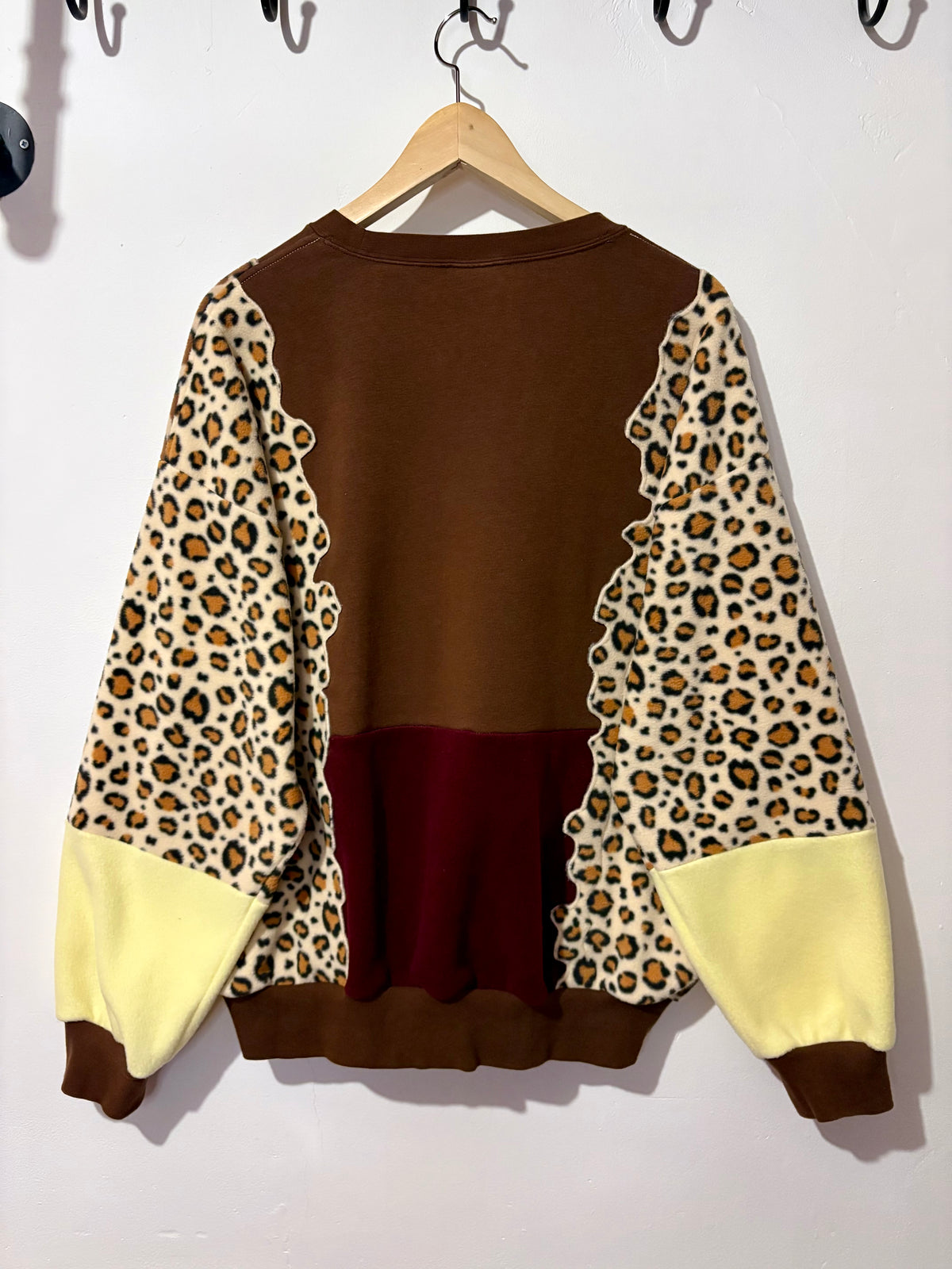 Y2K brown Nike air leopard print, burgundy and butter yellow fleece patchwork sweatshirt.