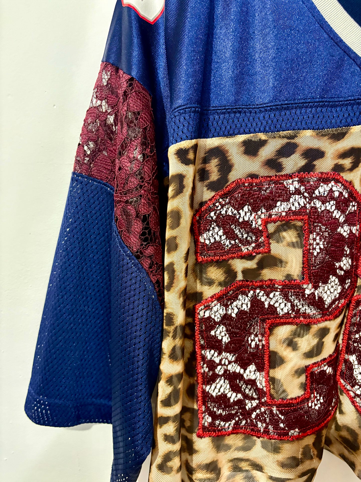 Vintage Y2K Reebok NFL New England Patriots leopard mesh, burgundy lace patchwork cropped jersey tshirt.