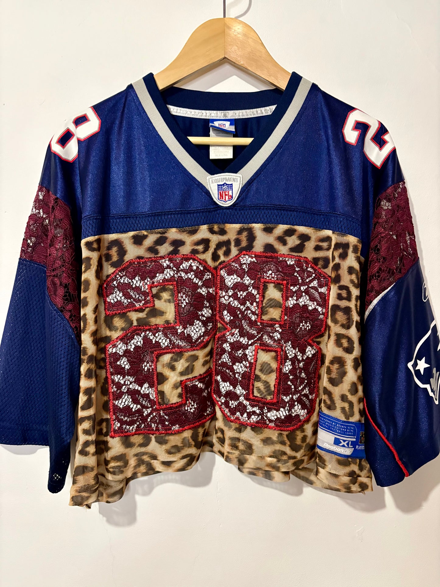 Vintage Y2K Reebok NFL New England Patriots leopard mesh, burgundy lace patchwork cropped jersey tshirt.