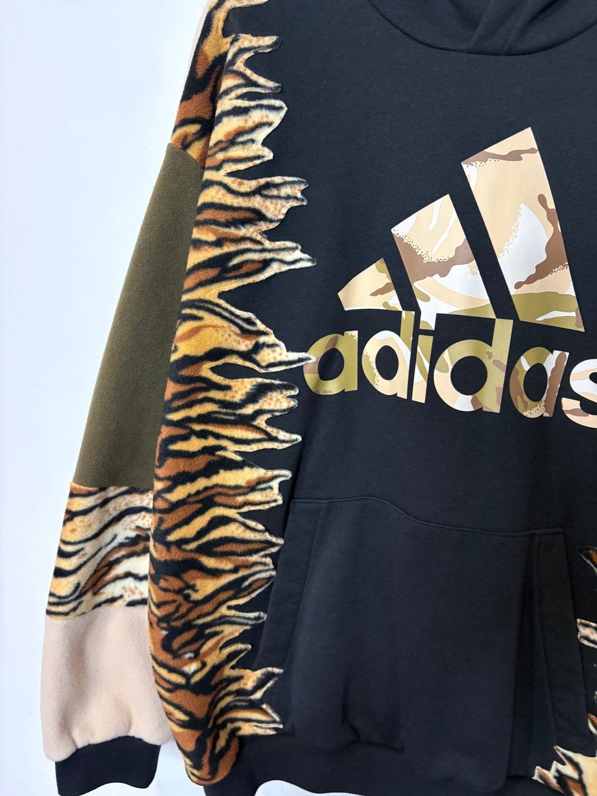 Y2K black adidas camouflage logo tiger stripe, khaki and beige fleece patchwork hoodie sweatshirt.