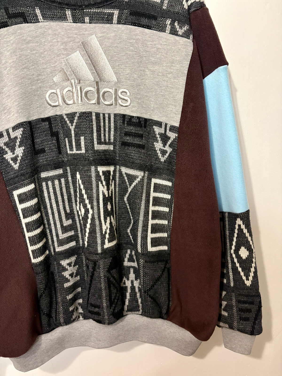 Vintage grey, brown and baby blue adidas logo funky pattern knit patchwork sweatshirt.