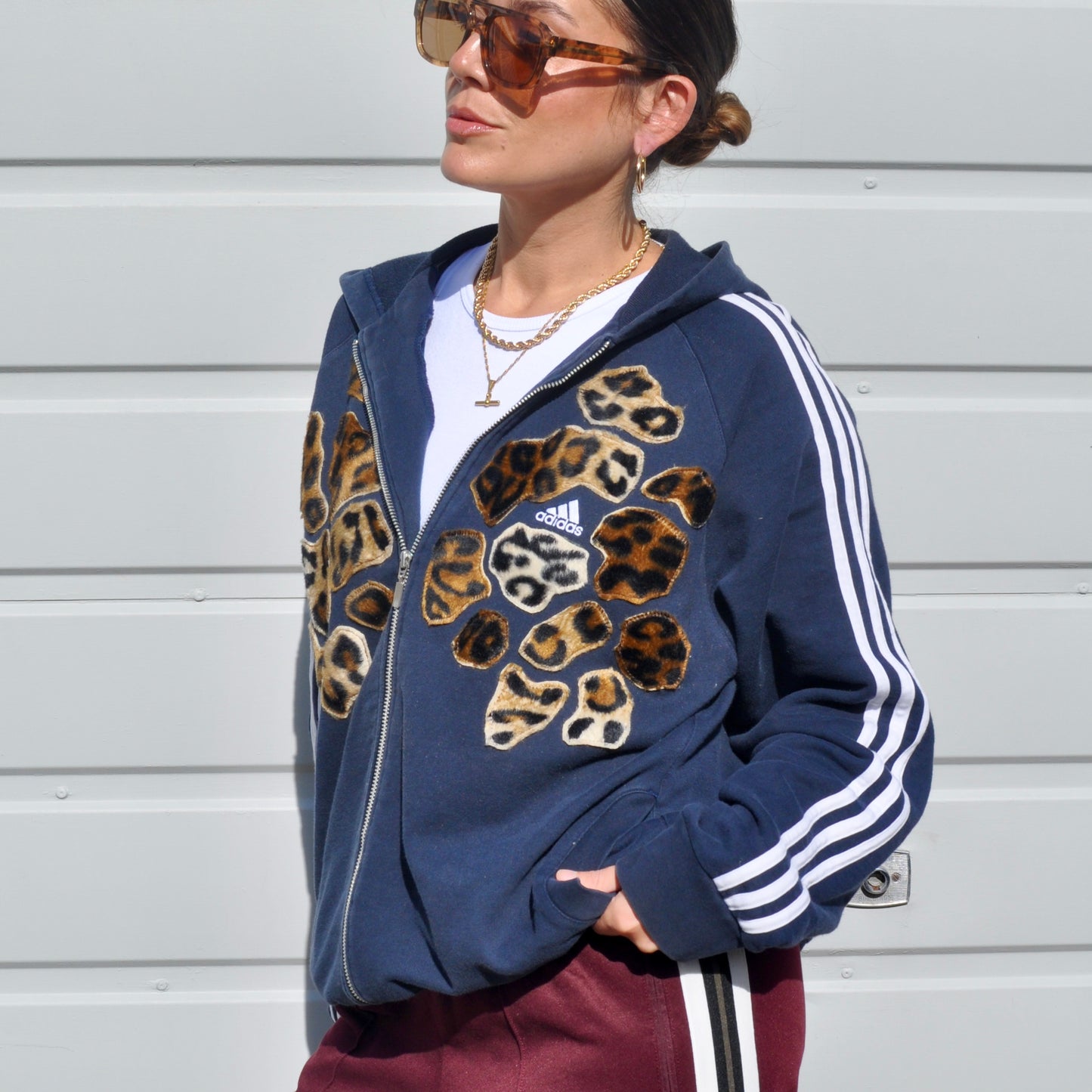 Navy blue adidas leopard patch hoodie sweatshirt.