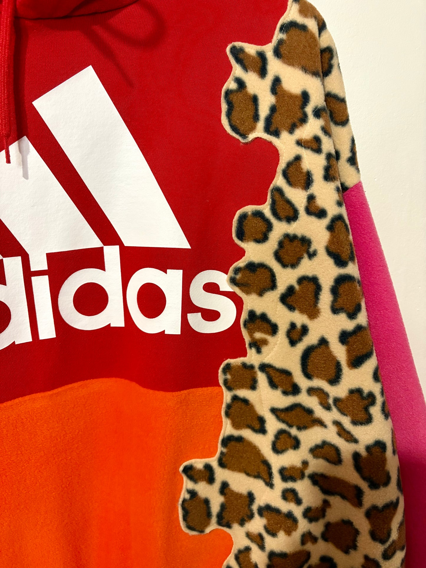 Y2K red adidas trefoil logo leopard print, pink and orange patchwork fleece hoodie sweatshirt.