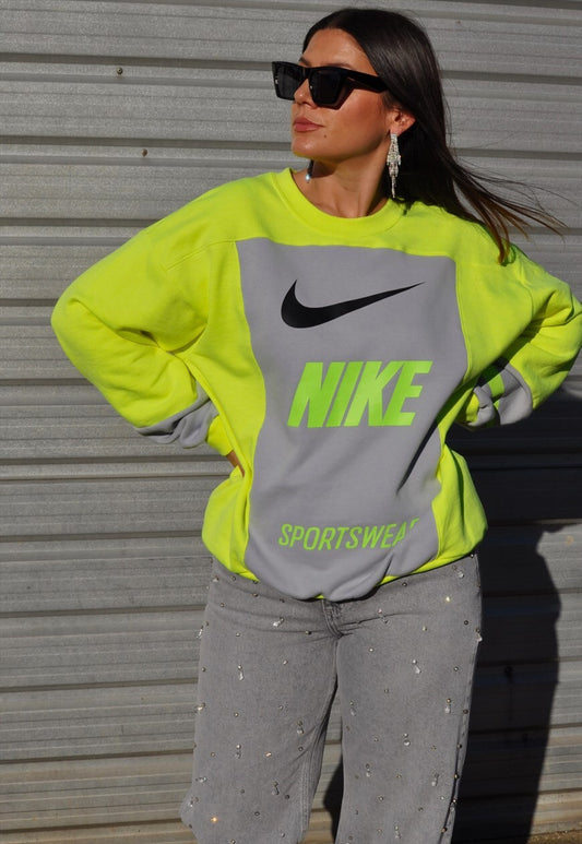 Y2K vintage reworked Nike patchwork logo neon yellow sweatshirt.